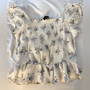 White and blue floral peplum top